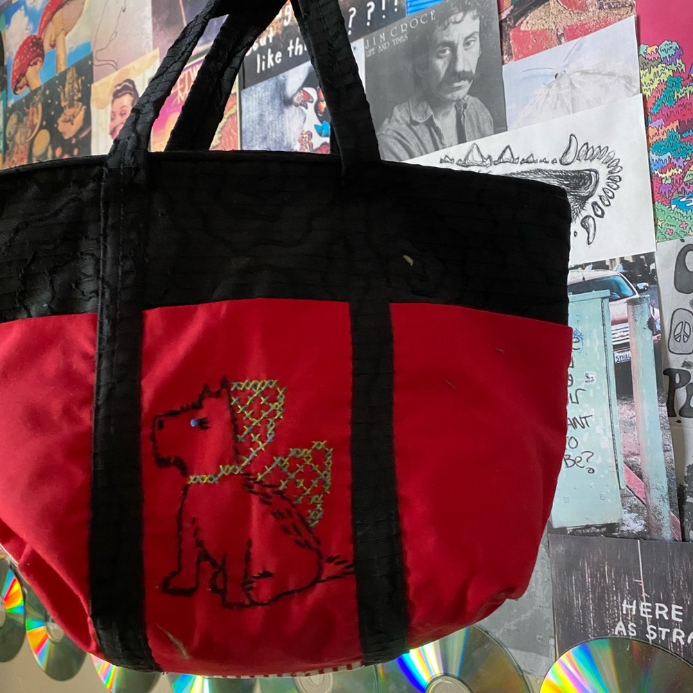 red and black terrier purse.